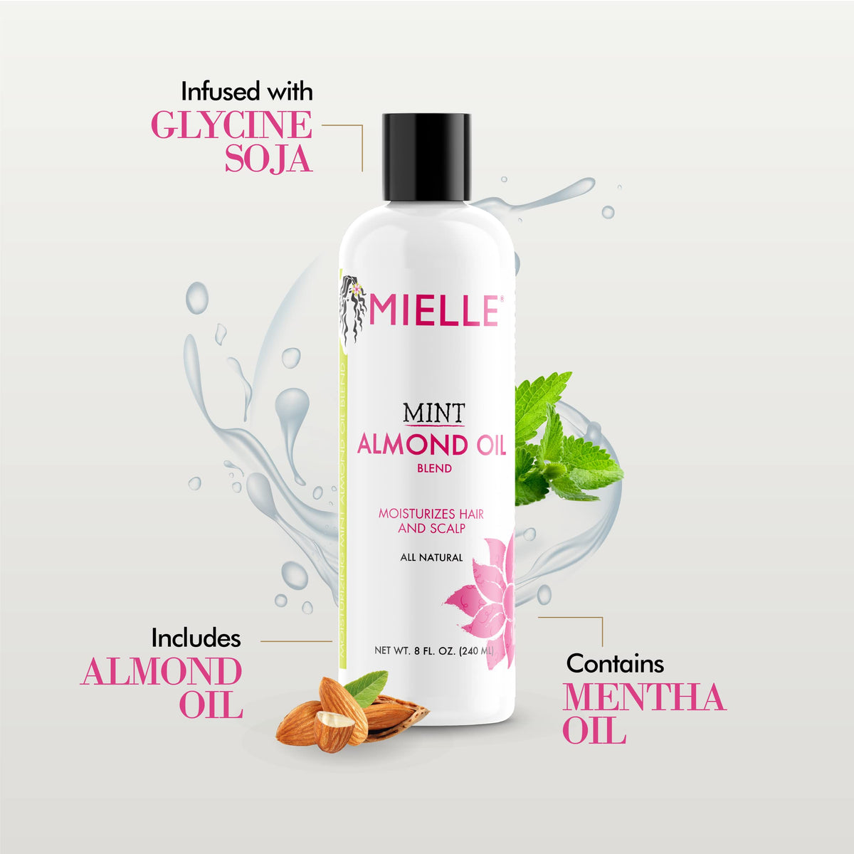 Applying Mielle Organics oil to scalp to soothe and lock in moisture