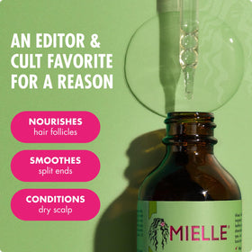 Mielle Organics oil texture on hand gleaming to show nourishing lightweight finish