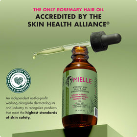 Mielle Organics scalp massage in progress demonstrating calming circulation benefit