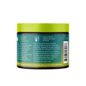 Mielle Organics scoop on finger showing creamy slip for easier detangling