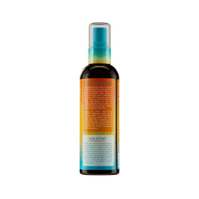 Mielle Organics spray in hand misting hair for smooth, protected styling