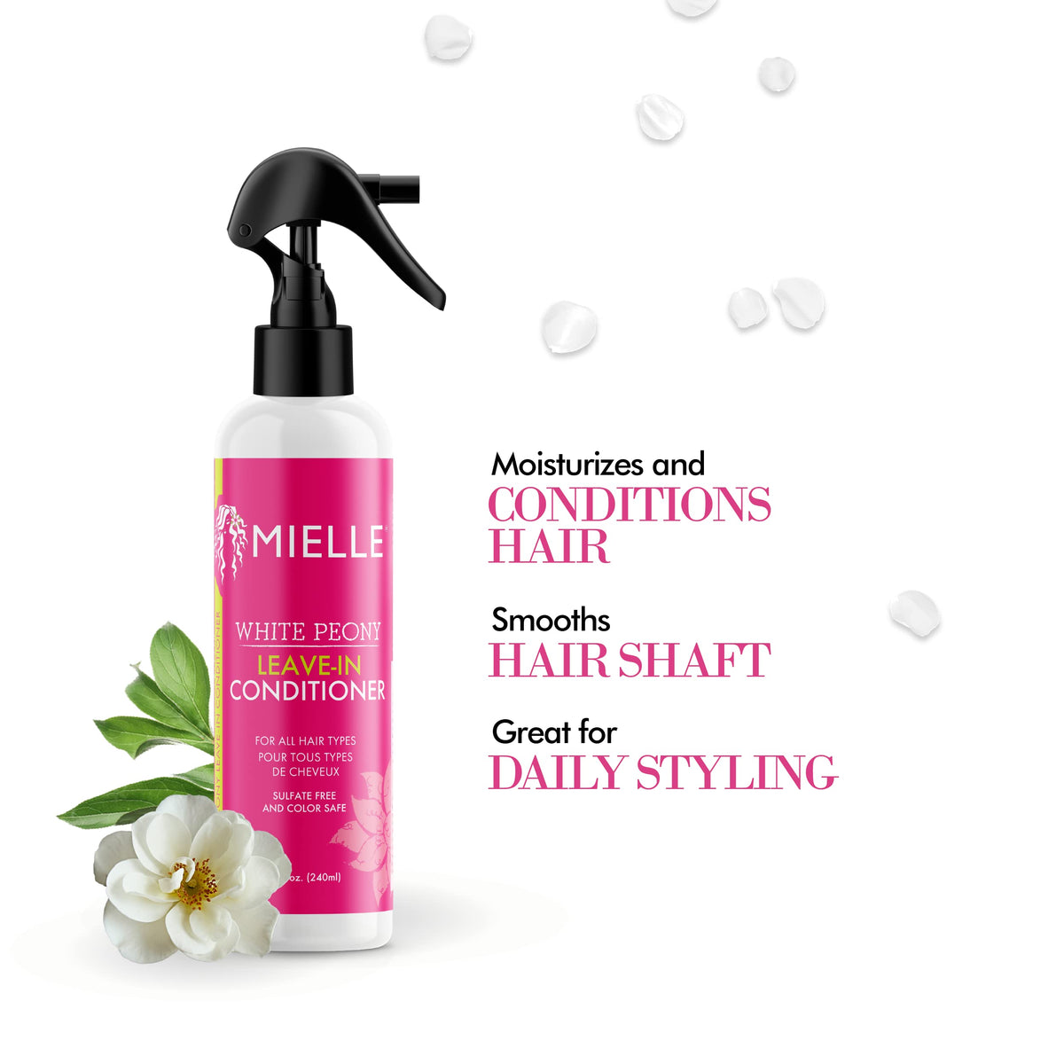 Mielle Organics being sprayed on curly hair for easier detangling and frizz control