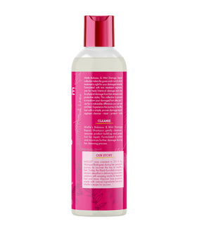 Mielle Organics shampoo paired with deep conditioner suggesting a repair routine