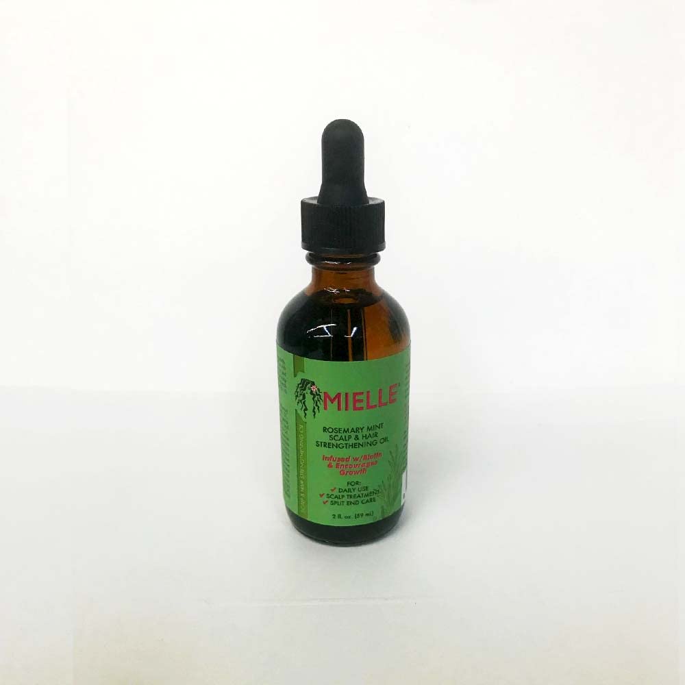 Mielle Organics scalp and hair oil dropper releasing drops for targeted strengthening and shine