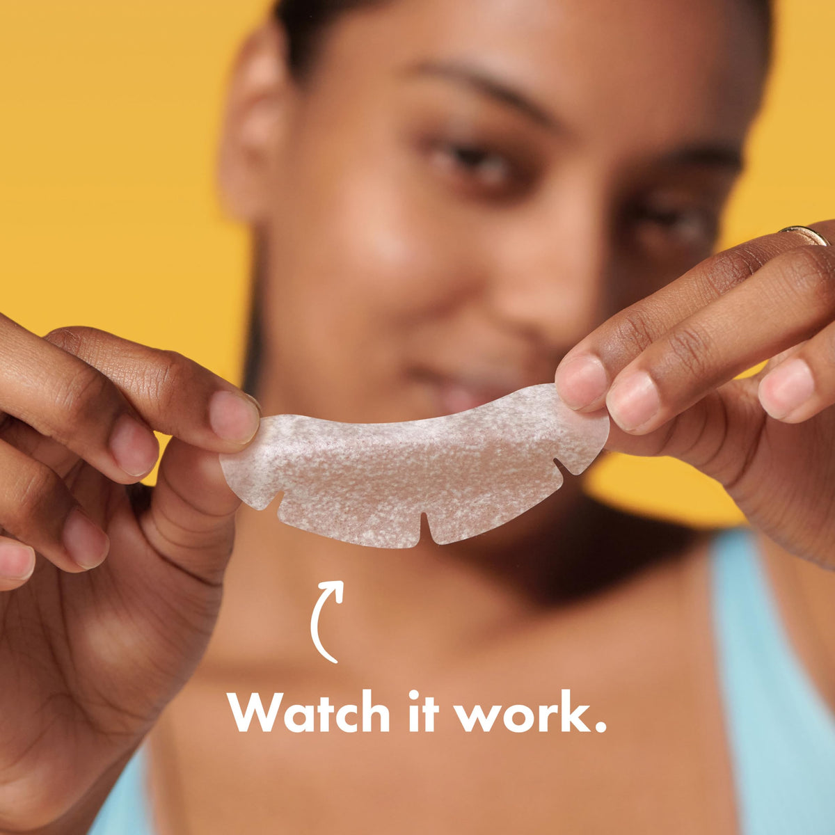 Mighty Patch chin held in hand demonstrating XL size for better blemish coverage