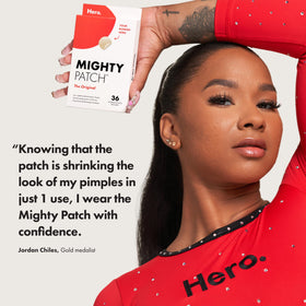Mighty Patch applied to cheek, brand patch covering blemish and protecting skin