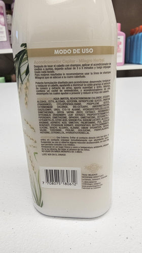 Milagros shampoo and conditioner staged in bathroom suggesting daily use