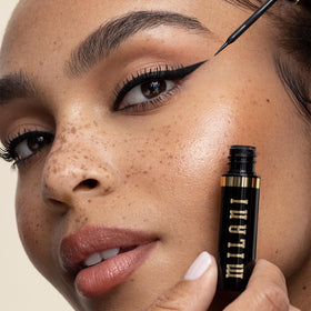 Milani application on eye creating a clean wing for precise definition