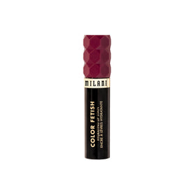Milani held in hand for scale showing compact size and travel-friendly benefit