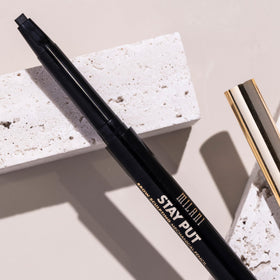 Milani product on vanity with mirror illustrating polished everyday brow results benefit