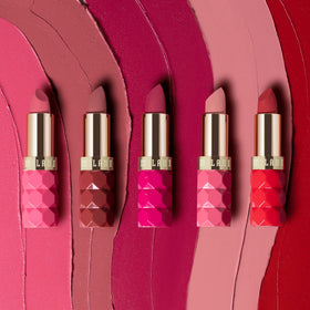 Milani lipstick applied on lips demonstrating velvet matte finish comfort