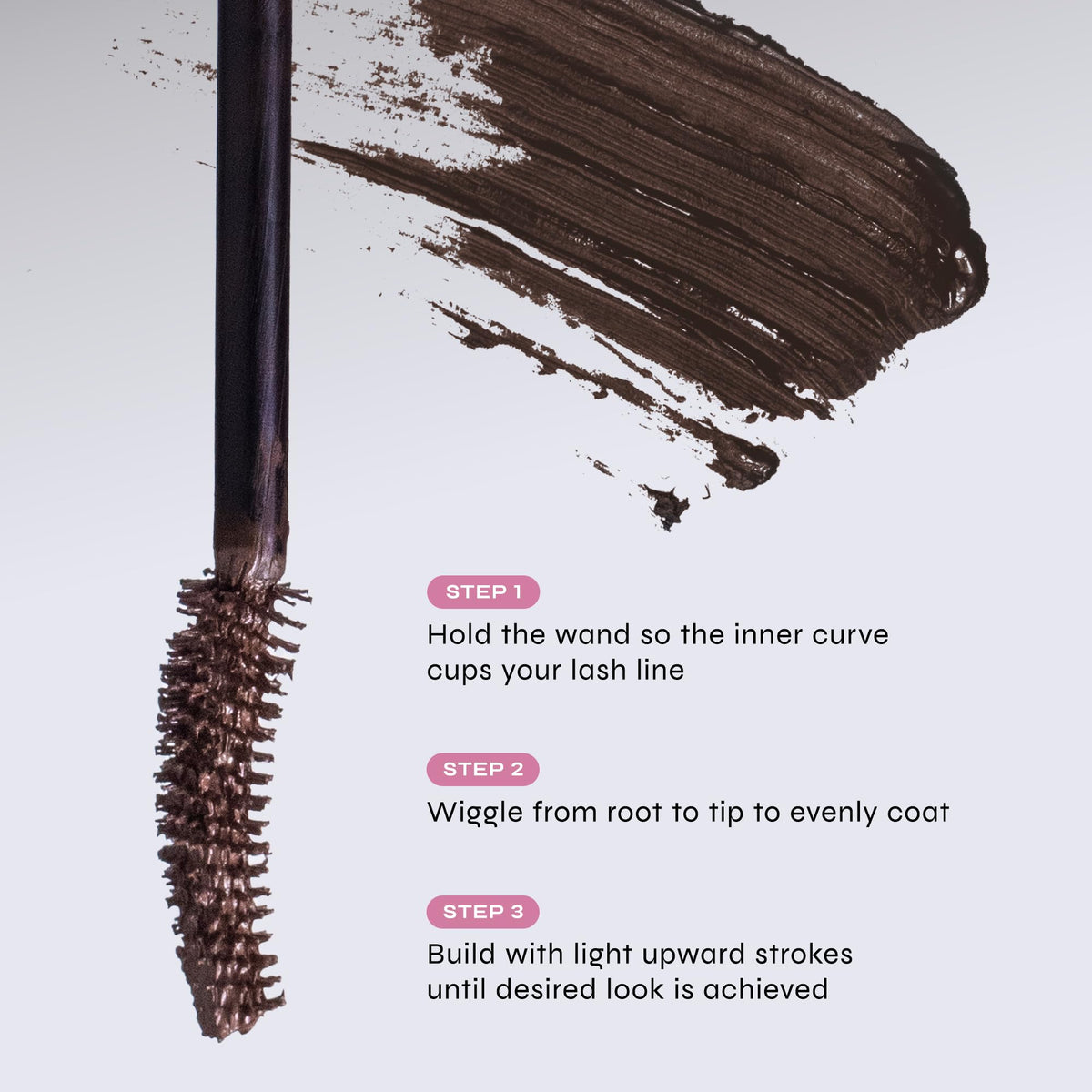 Milani mascara held in hand to show compact size and travel-friendly appeal