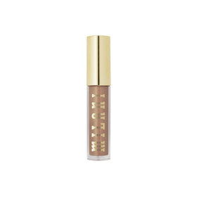 Milani gloss on dressing table lifestyle scene inspiring everyday beauty use