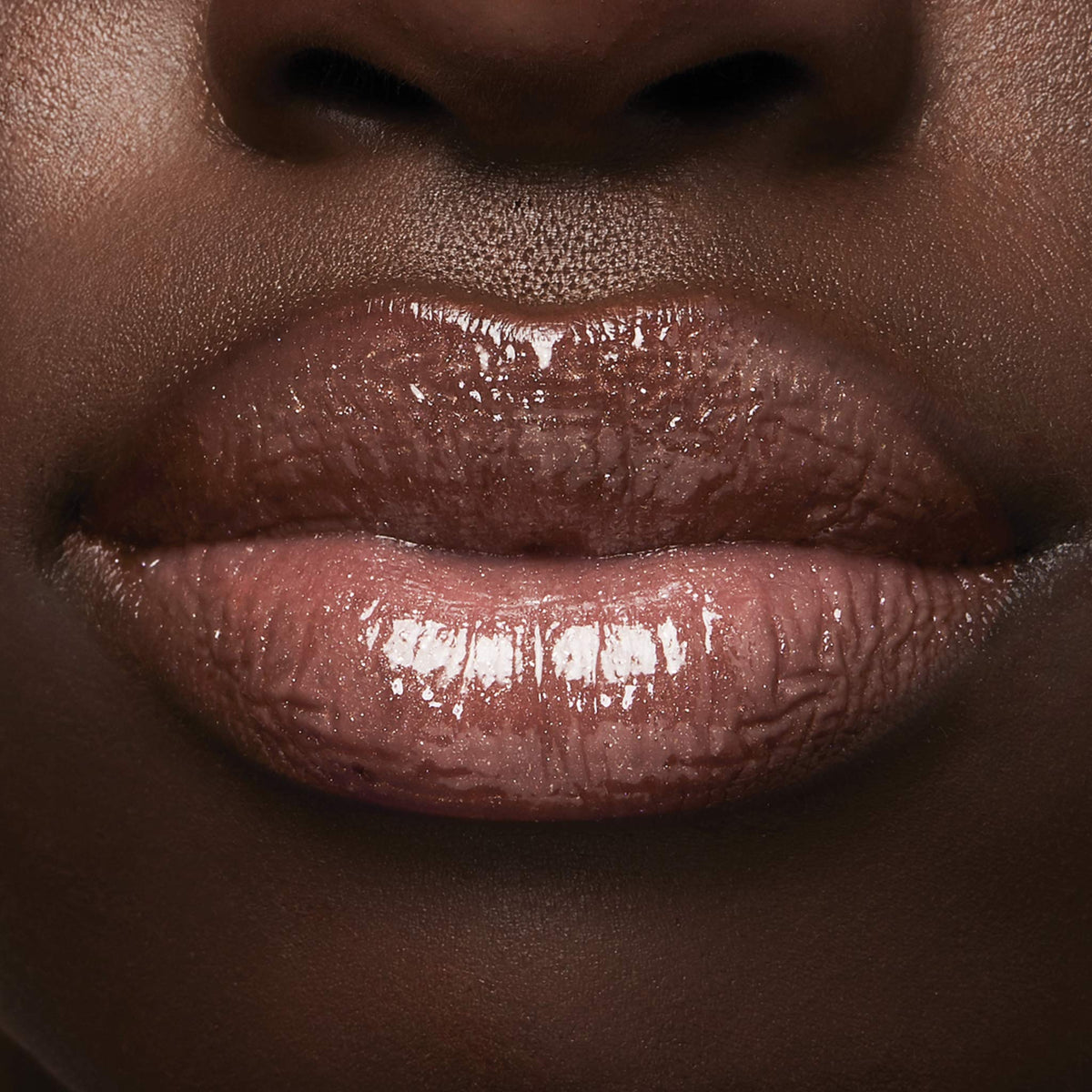 Milani label and shade name close-up showing Prismatic Peach identification benefit