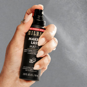 Milani product label close-up, shows ingredient and usage guidance benefit