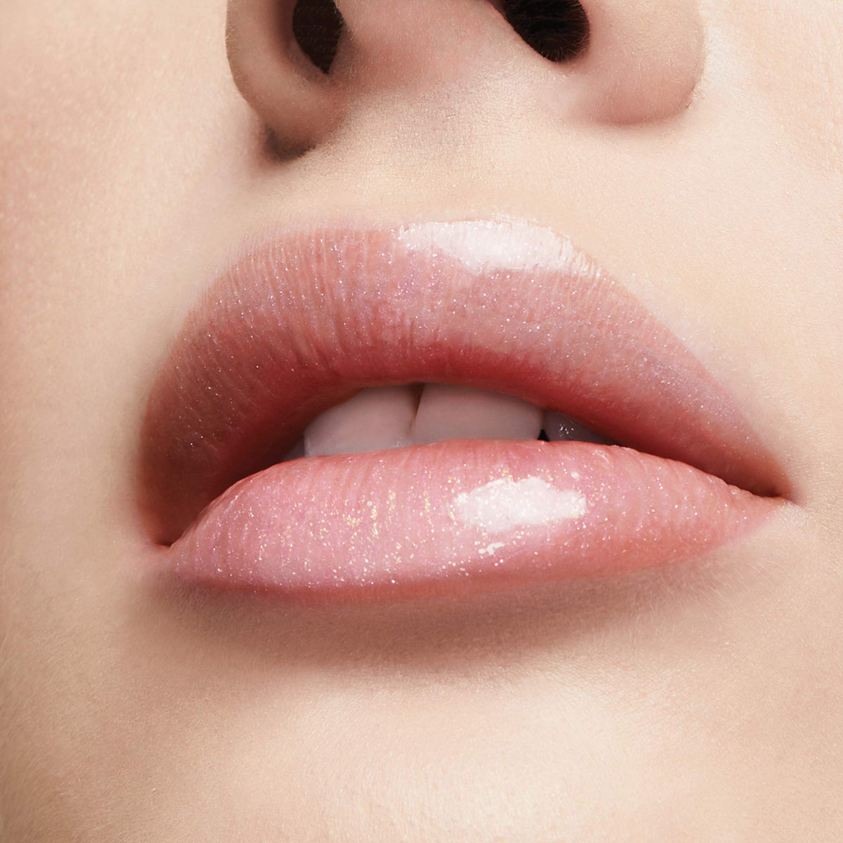 Milani packaging label close-up shows branding and product information benefit