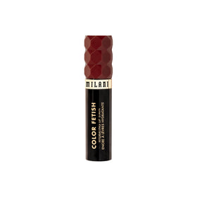 Milani lip swatch on deep skin showing true color payoff and comfortable finish