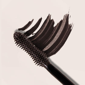 Milani mascara on model eyes showing lifted, volumized lashes