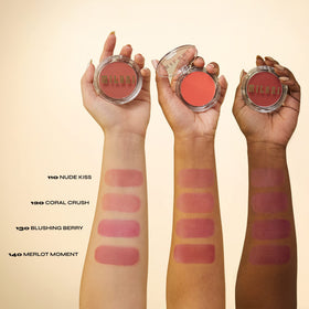 Milani Merlot Moment being blended with fingers for a seamless finish benefit