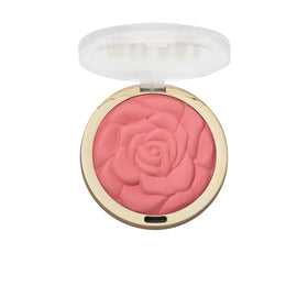Milani blush beside lipstick showing compact size and travel convenience benefit