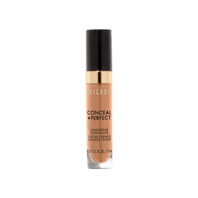 Milani concealer tube next to hand for size reference and travel-friendly portability