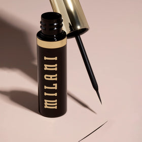 Milani size comparison next to coin showing compact travel-friendly benefit