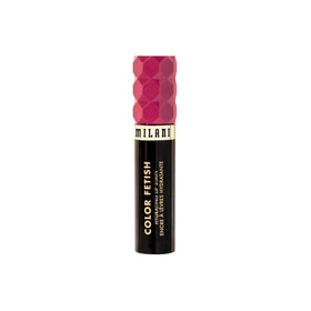 Milani size comparison next to coin to show travel-friendly convenience