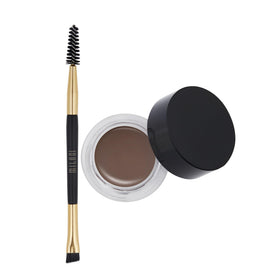 Milani on vanity styled scene showing polished everyday brows