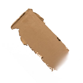 Milani stick texture close-up highlighting soft-matte finish and pore-blurring effect