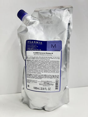 Milbon pump and rich lather on hand demonstrating gentle cleansing and hydration benefits