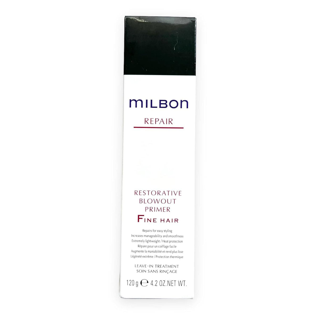 Milbon primer dispensed on hand being applied to damp hair to improve styling control and manageability