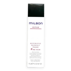 Milbon primer dispensed on hand being applied to damp hair to improve styling control and manageability
