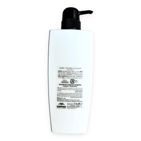 Milbon pump dispensing creamy shampoo texture for gentle, low-friction cleansing