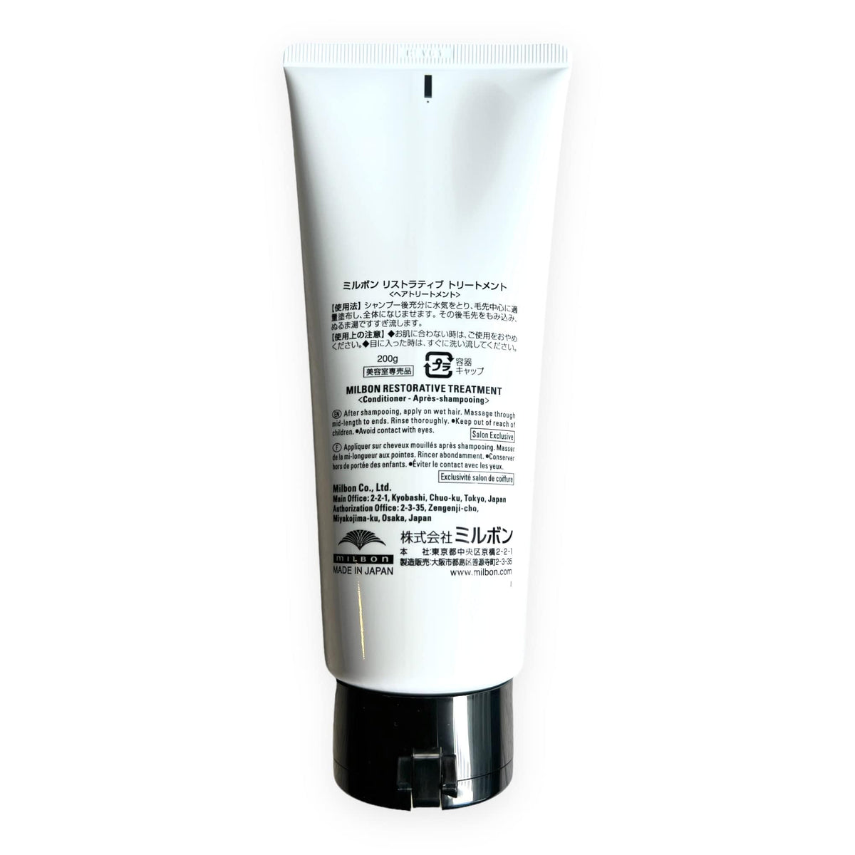 Milbon treatment applied to damp hair in bathroom, demonstrating easier detangling benefit