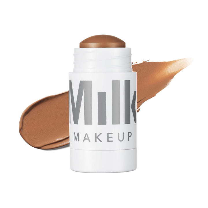 Milk Makeup bronzer stick front view shows compact matte packaging and portability