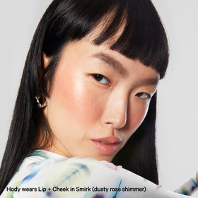 Milk Makeup next to common items showing size comparison and travel-ready benefit