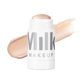 Milk Makeup Turnt stick front view showing compact luminous packaging and easy application