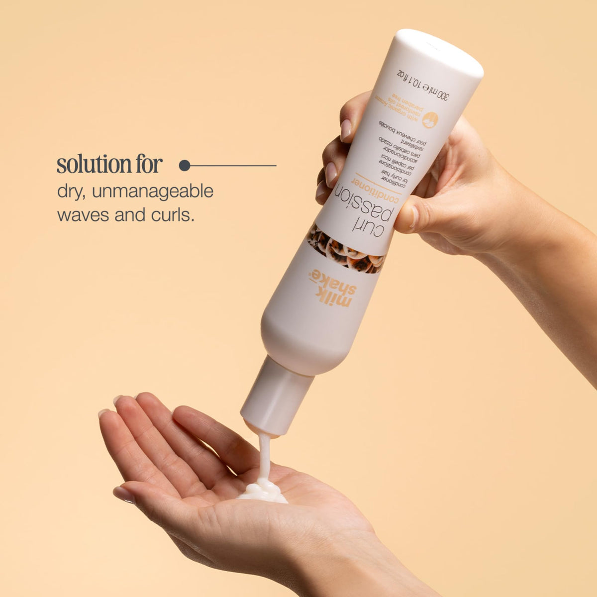 milk_shake bottle held in hand to show 10.1 fl oz scale and practicality