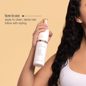milk_shake applied to damp curls showing improved slip for detangling