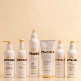 milk_shake lifestyle on beach showing tropical scent and sun-ready curls