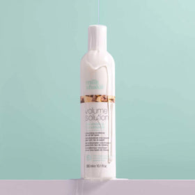 milk_shake bottle on bathroom shelf suggesting everyday color-safe routine