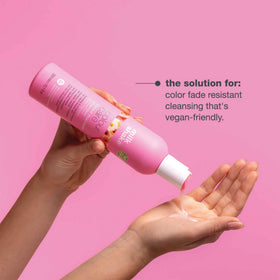 milk_shake shampoo in hand lathering to show soft manageable hair benefit