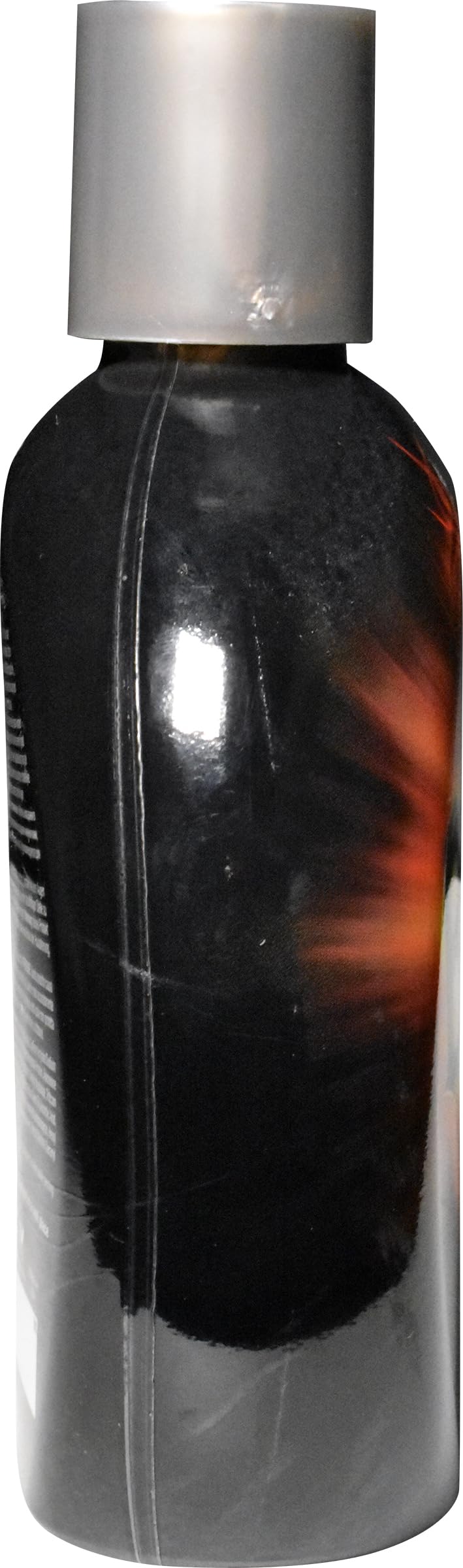 Millennium Tanning label close-up displaying 60x Mega Tingle and ingredient clarity benefit