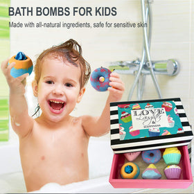 Mineral Me California bath bomb fizzing in tub creating bubbles and colorful water