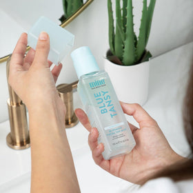 MINETAN BODY.SKIN applicator mitt beside bottle showing blending and streak-free benefit