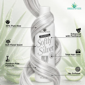 Miracle of Aloe lather on gray hair in hand demonstrating gentle cleansing action