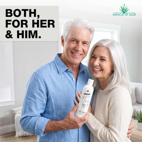 Miracle of Aloe bottle held in hand for size and scale, travel-friendly benefit