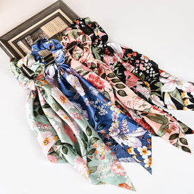 mirlern front view packaging showing four lily scrunchies and colors for styling