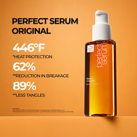 Applying Mise En Scene serum to damp hair to reduce frizz and tangles