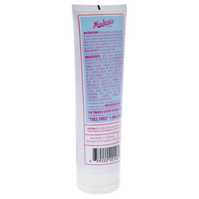 Miss Jessie's lotion applied on curly hair in hand demonstrating soft definition